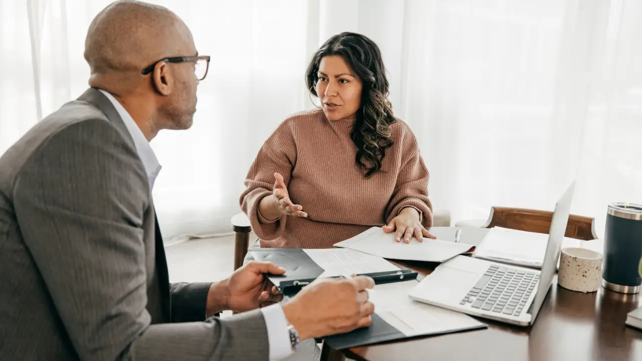 Couple reviewing fixed-rate mortgage paperwork with WestPac Lending