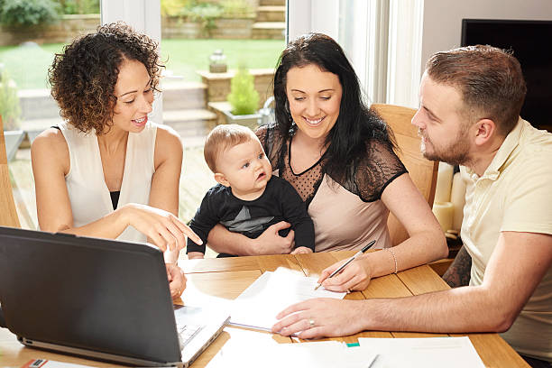 Family reviewing fixed-rate mortgage options with a loan professional